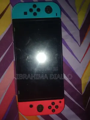 À VENDRE : Nintendo Switch V2 - Joy-Con Bleu Turquoise / Rouge - Jeu I