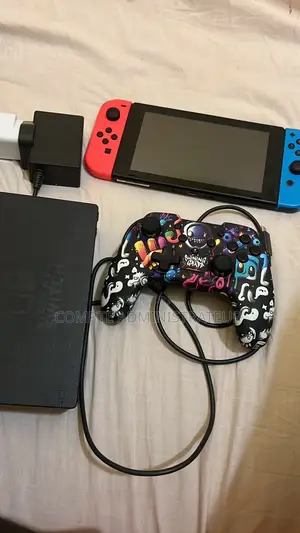 Nintendo Switch Flashé Avec 5 Jeux Et Matoss Complet