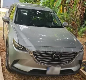 Mazda CX-9 Touring Plus 2023 Gris