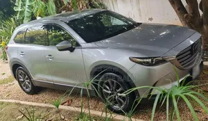 Mazda CX-9 Touring Plus 2023 Gris
