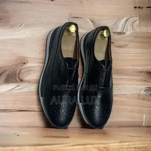 Berluti en Cuir