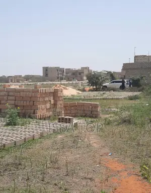 Terrain De 200 M2 Titre Foncier a La Cité Comico Bambilor