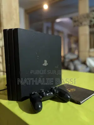 Photo - Playstation 4 Pro - 1 To