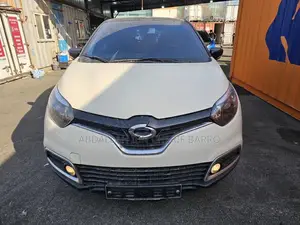 Photo - Renault Captur 1.5 Diesel FWD 2017 Doré