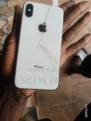 Photo - Pomme iPhone X 64 GB Blanc