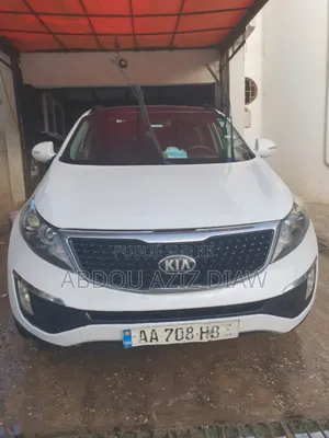 Photo - Kia Sportage SX 4dr SUV AWD (2.0L 4cyl 6A) 2012 Blanc cassé