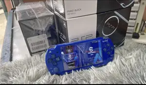 Photo - PSP Slim Neuf Dans Carton 32 Jeux Accessoires Complet