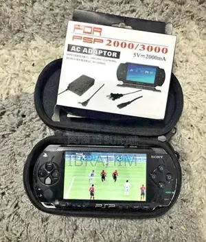 Photo - PSP Neuf Avec 20 Jeux Accessoires Complet