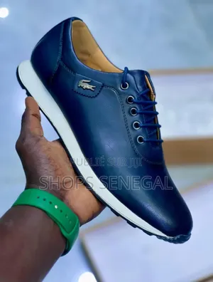 Photo - Lacoste Élégance – Le Style Sport Chic Au Quotidien