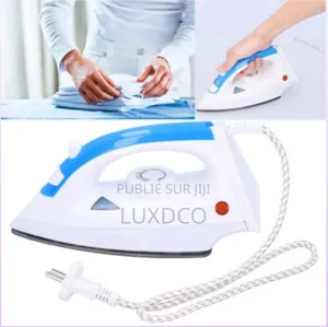 Fer À Repasser À Vapeur Ergonomique.