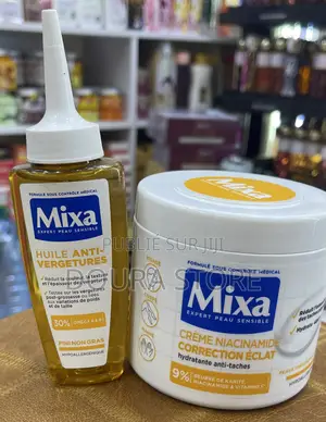 Photo - Crème De Visage Et Corps Plus Huile Vergetures