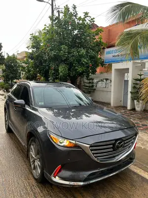 Photo - Mazda CX-9 Sport FWD 2020 Gris