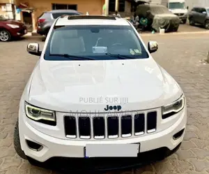 Photo - Jeep Grand Cherokee Limited 4dr SUV (3.6L 6cyl 8A) 2015 Blanc