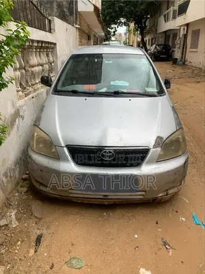 Photo - Toyota Corolla Base 4dr Sedan (1.8L 4cyl 5M) 2010 Gris