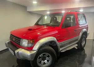 Photo - Mitsubishi Pajero Junior 1997 Rouge