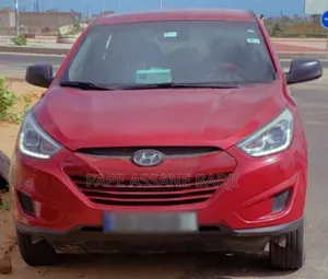 Photo - Hyundai Tucson SE AWD 2014 Rouge