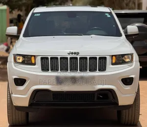 Photo - Jeep Grand Cherokee Laredo 4dr SUV 4WD (3.6L 6cyl 8A) 2015 Blanc