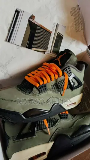 Photo - Air Jordan 4 “Undefeated” – Olive Orange Edition