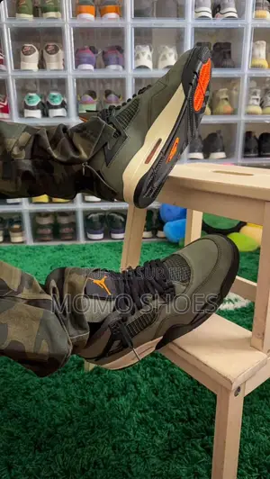 Air Jordan 4 “Undefeated” – Olive Orange Edition