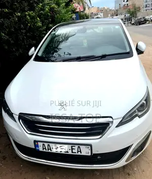 Photo - Peugeot 308 2014 Blanc