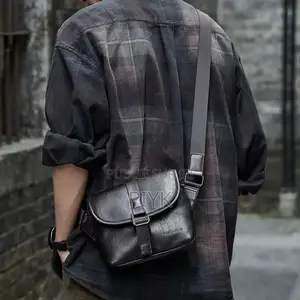 Photo - Sacoche en Cuir Noir