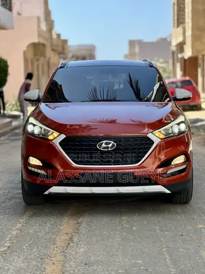 Photo - Hyundai Tucson Limited FWD 2017 Rouge