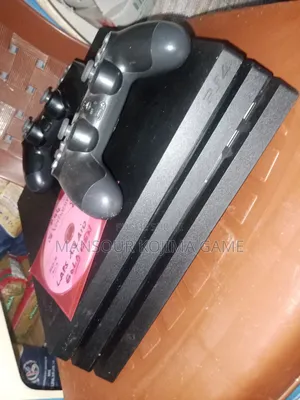 Photo - Console Ps4 Pro Flaché