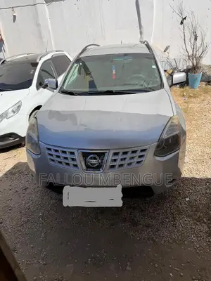 Photo - Nissan Rogue 2010 Gris