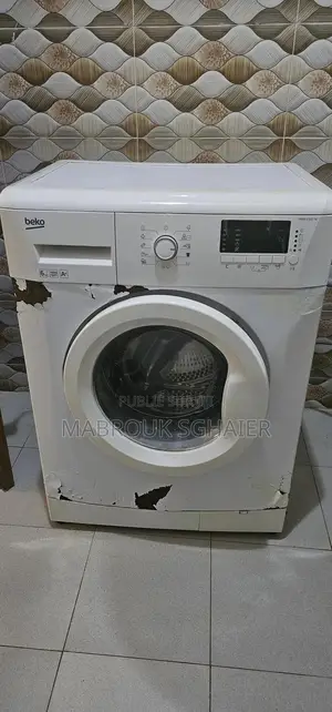 Photo - Machine a Laver