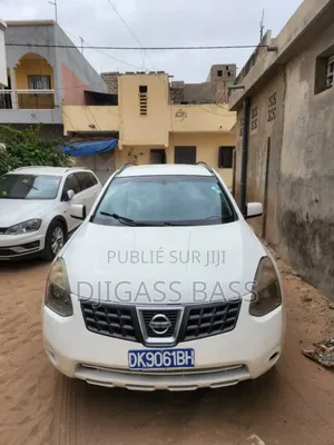 Photo - Nissan Rogue 2011 Blanc cassé