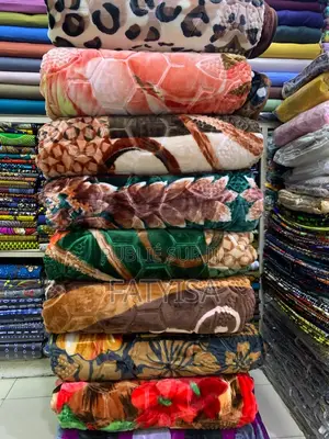 Photo - Mbadjie Grand Taille