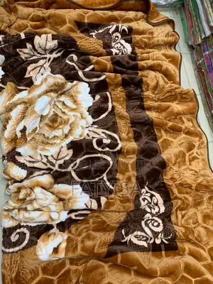 Mbadjie Grand Taille