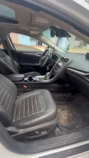 Ford Fusion Titanium 4dr Sedan AWD w/EcoBoost (2.0L 4cyl Turbo 6A) 2014