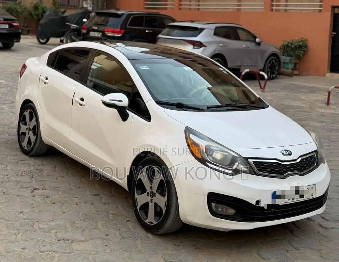 Kia Rio SX 4dr Hatchback (1.6L 4cyl 6A) 2015 Blanc