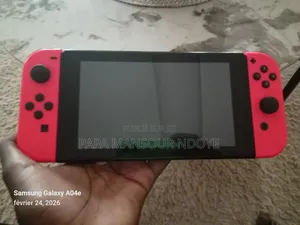 Nintendo Switch Plus 1 Jeux Et Un Sac Offert