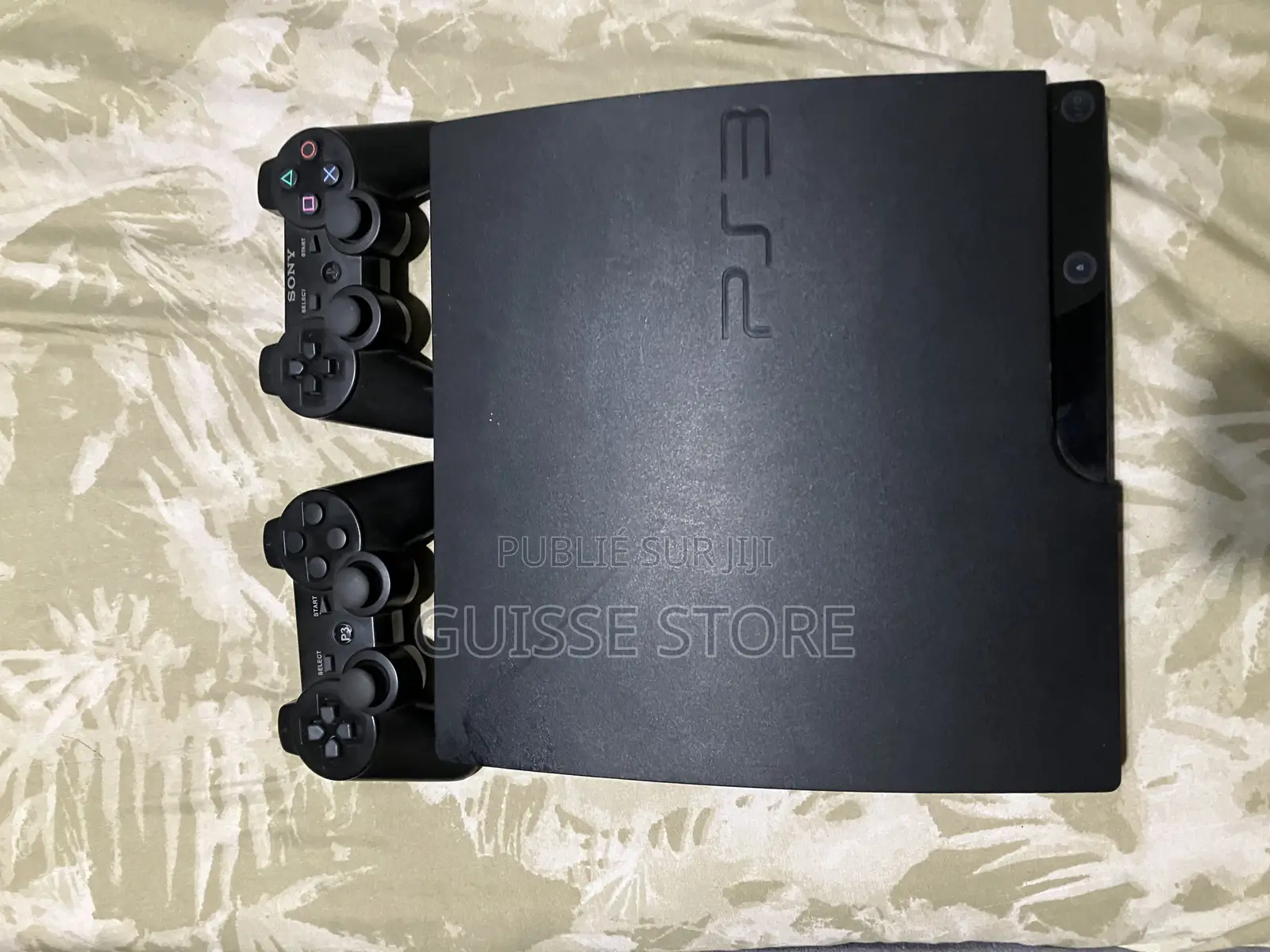 Ps3 Flashe Avec Des Jeux Et Deux Manettes