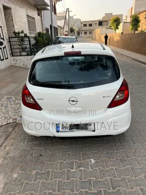 Opel Corsa 2010 Blanc cassé