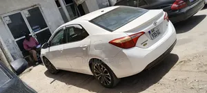 Toyota Corolla L 4dr Sedan (1.8L 4cyl 4A) 2015 Blanc
