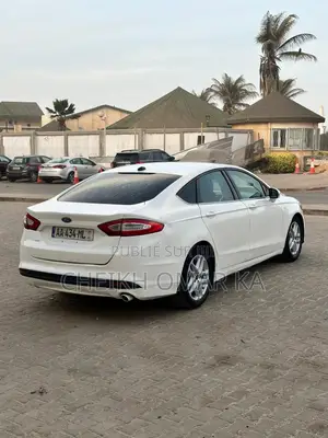 Ford Fusion SE 4dr Sedan AWD w/EcoBoost (2.0L 4cyl Turbo 6M) 2015 Blanc