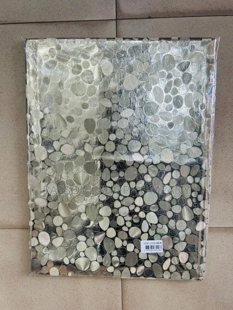 Nappe Toile Dimension 1m50x1m37 Prix:2000f