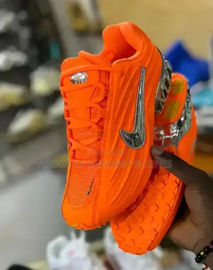 Nike Nocta White Et Orange Disponible