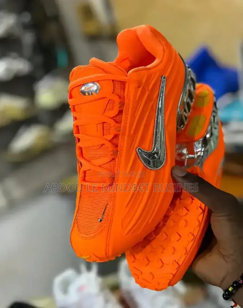 Nike Nocta White Et Orange Disponible