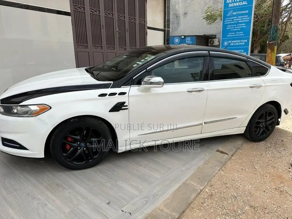 Ford Fusion Titanium 4dr Sedan AWD w/EcoBoost (2.0L 4cyl Turbo 6A) 2014