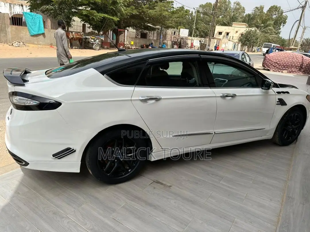 Ford Fusion Titanium 4dr Sedan AWD w/EcoBoost (2.0L 4cyl Turbo 6A) 2014
