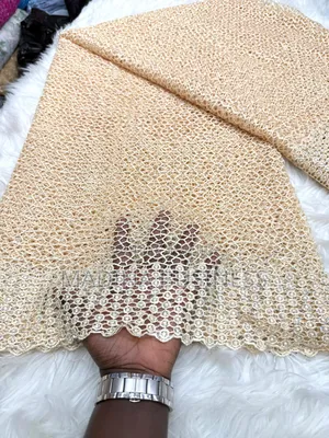 Vendeur De Tissu