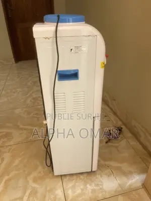 Réfrigérateur + Fontaine À Eau en Bon État