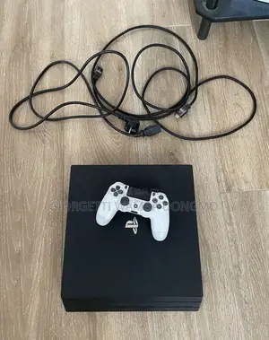 Ps4 Pro + Une Manette Et Jeux