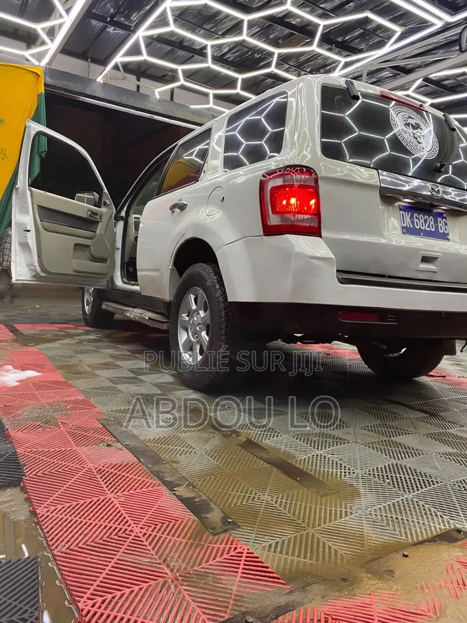 Mazda 1000 2012 Blanc
