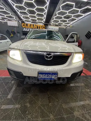 Mazda 1000 2012 Blanc